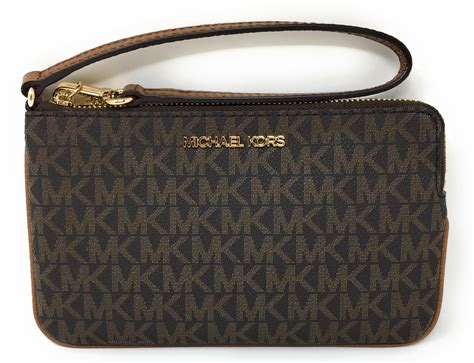 michael kors jet set large zip clutch wristlet|Michael Kors double zipper wallet.